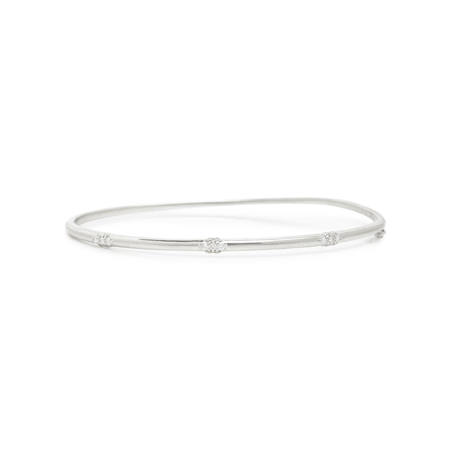 ANNA SHEFFIELD, WHITE GOLD AND DIAMOND 'CELESTINE THREE CLUSTER' BANGLE BRACELET
