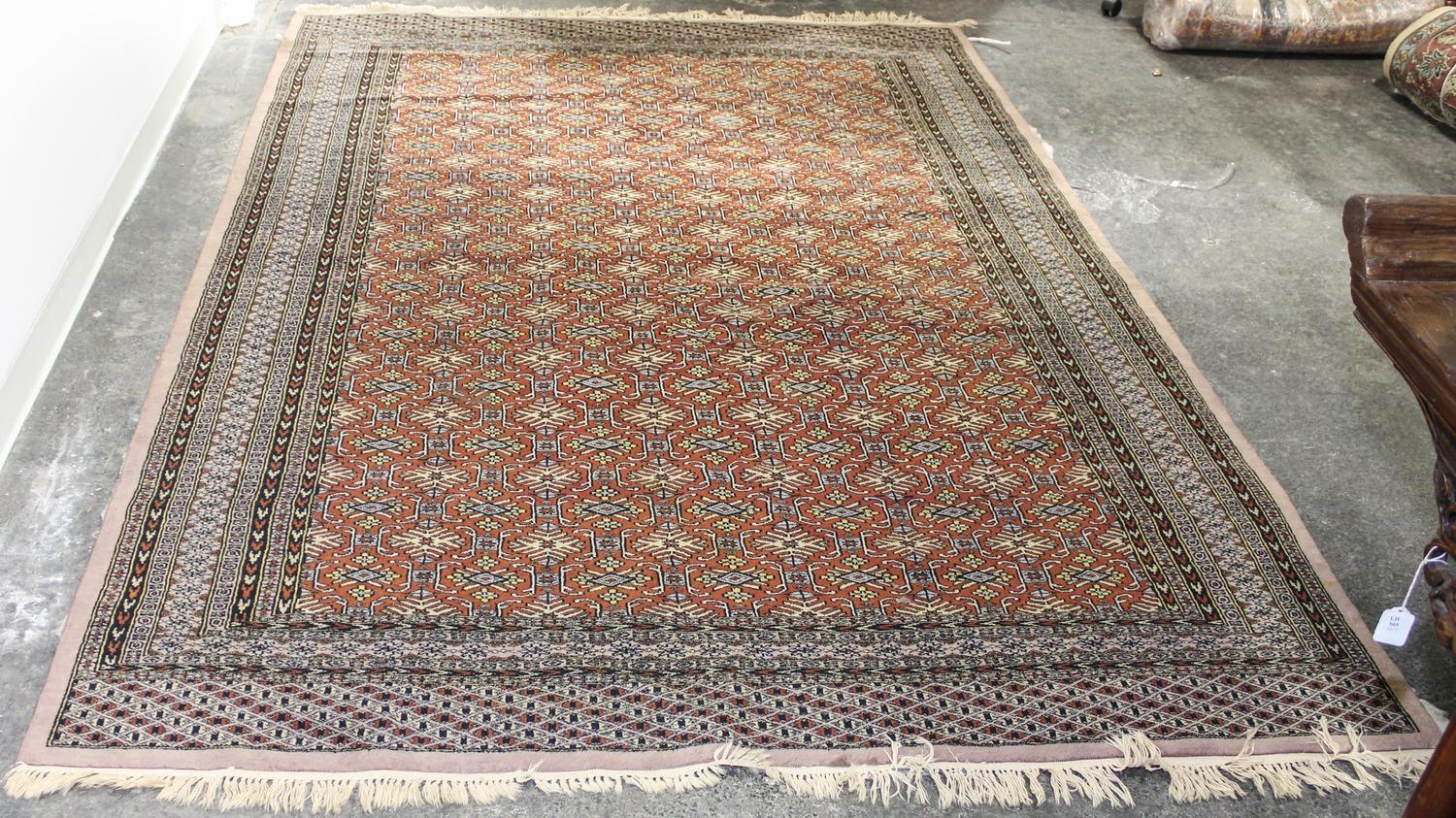 A Persian Wool Rug 9 feet x 6 feet 3 inches.