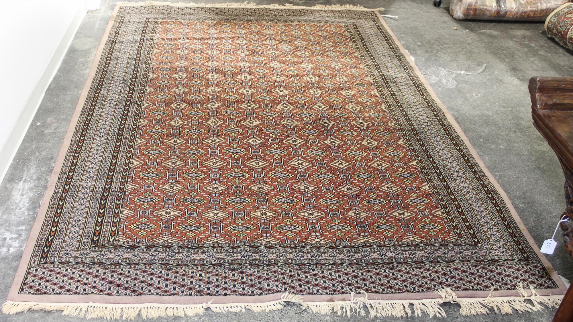 A Persian Wool Rug 9 feet x 6 feet 3 inches.