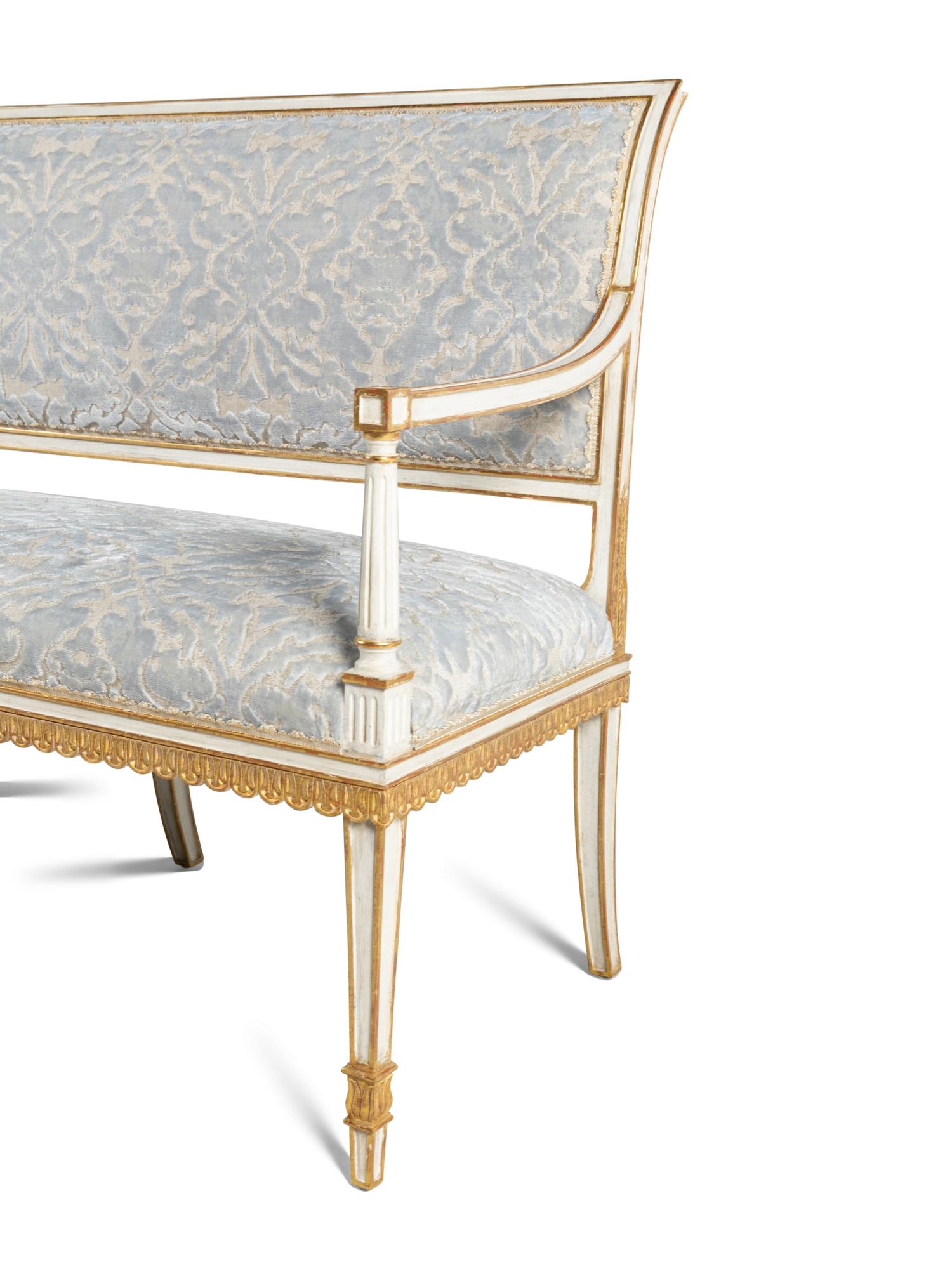 A Neoclassical Style Painted and Parcel Gilt Settee