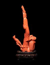 A Chinese Carved Red Coral Figure of A Female Immortal