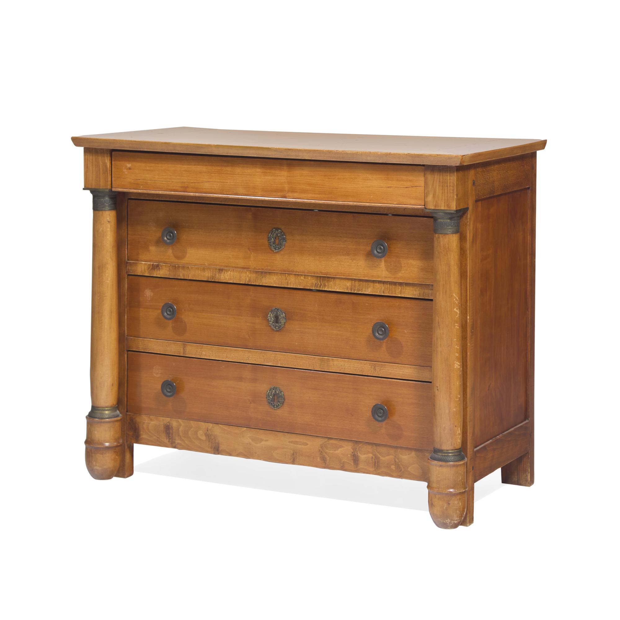 An Empire Fruitwood, Beechwood and Gilt-Metal Mounted Chest of Drawers