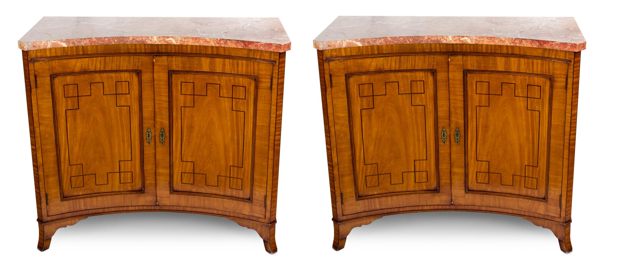 A Pair of Regency Satinwood and Mahogany-Strung Concave-Fronted Side Cabinets Height 35 x width 40 x depth 18 inches. — 19TH CENTURY