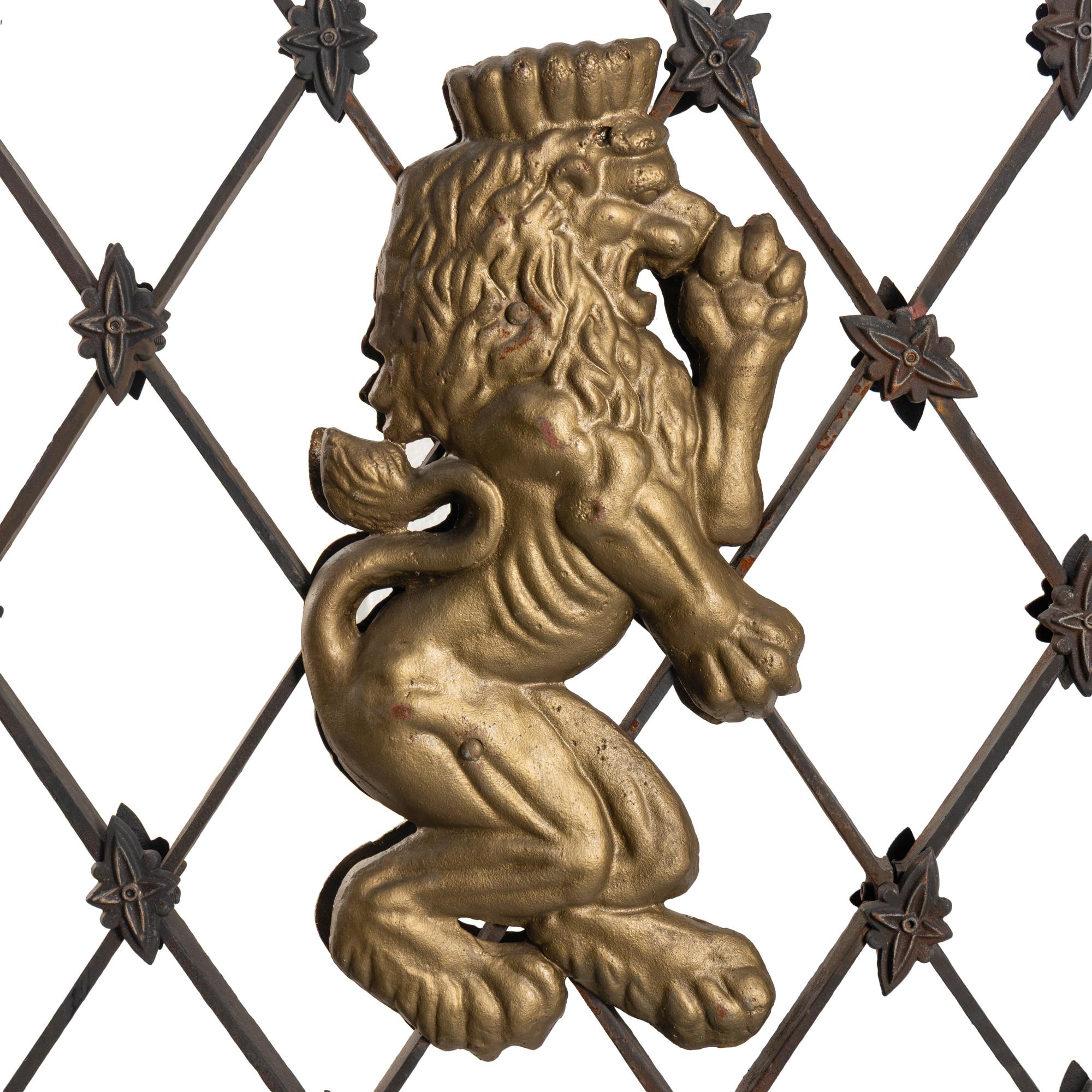 A Pair of Parcel Gilt Iron and Metal Lion-Decorated Gates