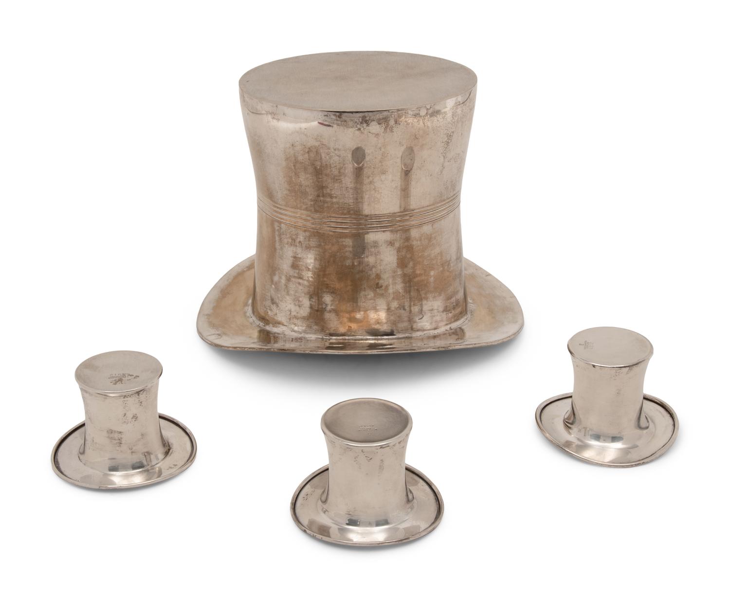 A Group of Four Silver and Silver-Plate Top-Hat Form Table Articles