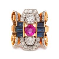 A Retro Platinum Topped Rose Gold, Ruby, Diamond and Sapphire Ring, 10.30 dwts.