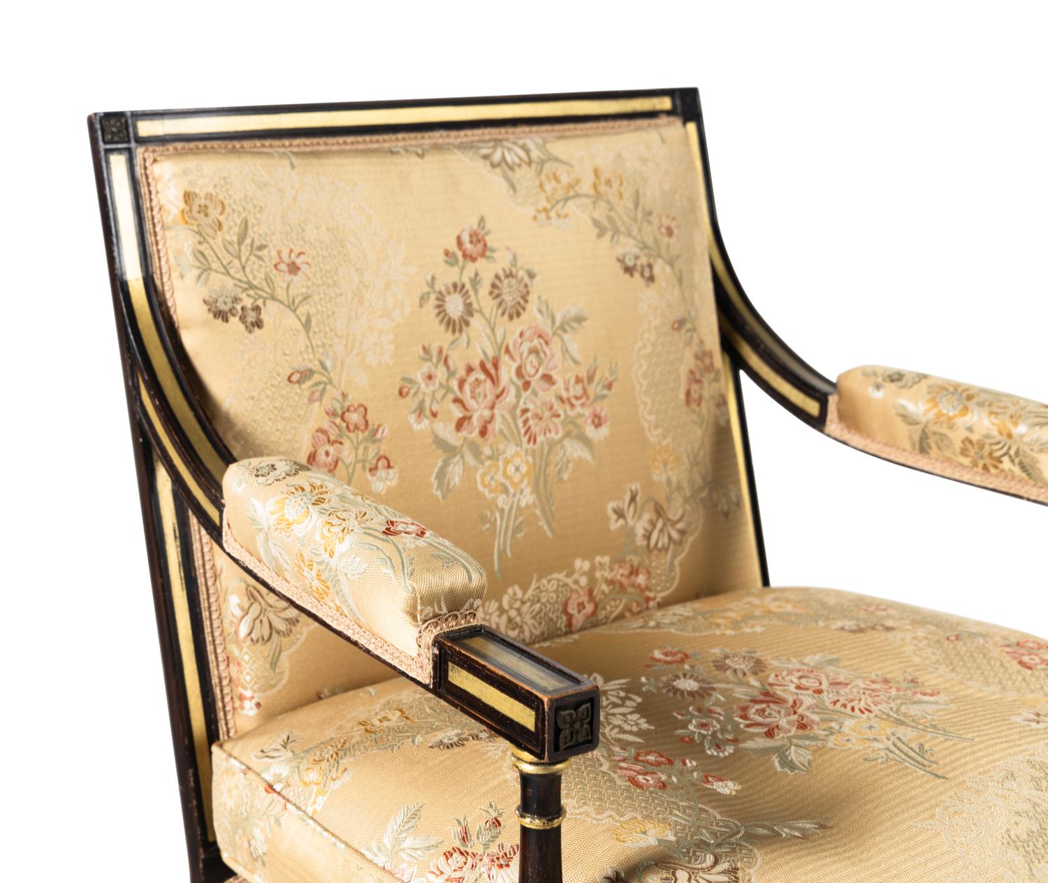 A Pair of Regency Style Painted and Parcel Gilt Armchairs