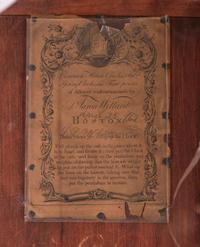 A Federal Carved, Inlaid and Figured Mahogany Tall Case Clock