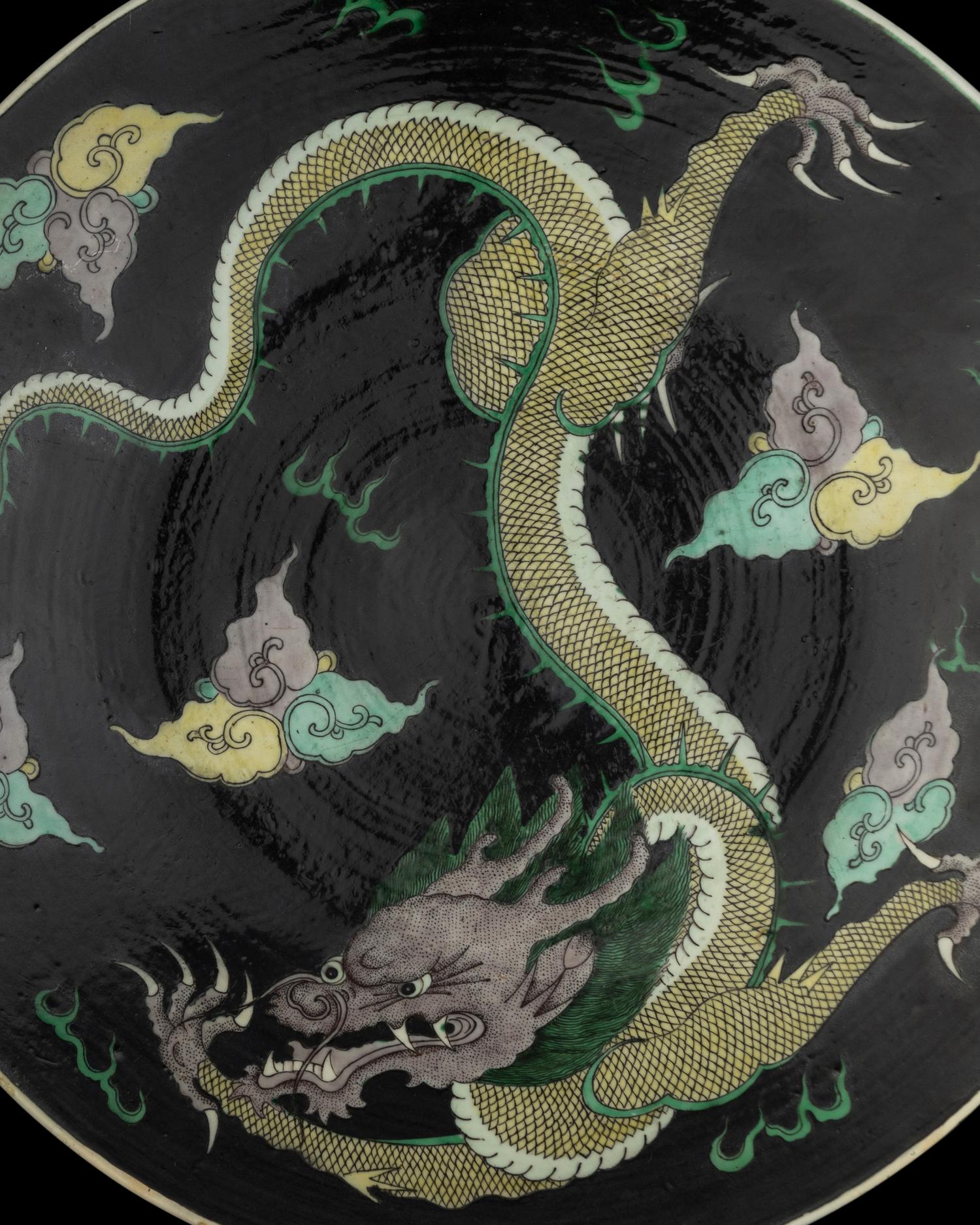 A Chinese Famille Noire Porcelain 'Dragon' Charger