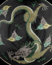 A Chinese Famille Noire Porcelain 'Dragon' Charger