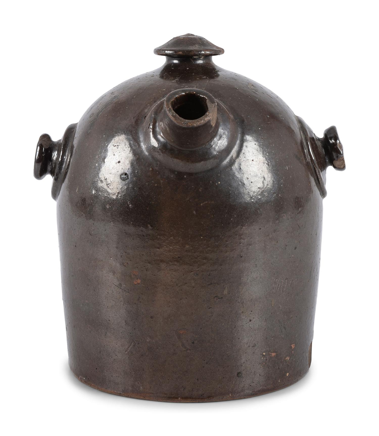 A Scrafitto Incised Albany Slip Stoneware Harvest Jug