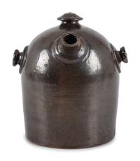 A Scrafitto Incised Albany Slip Stoneware Harvest Jug