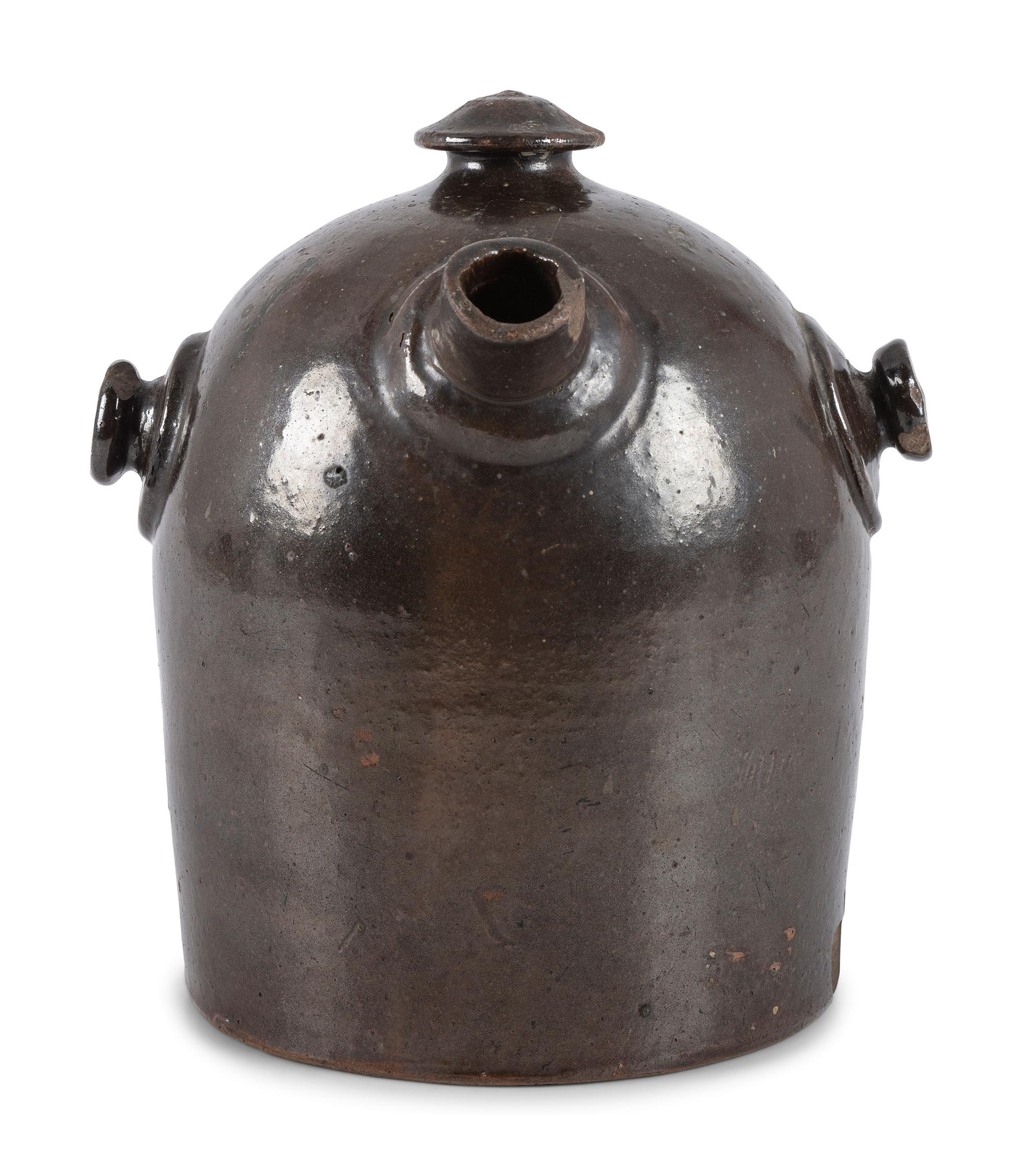 A Scrafitto Incised Albany Slip Stoneware Harvest Jug
