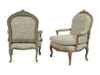 A Pair of Louis XV Style Green-Painted and Parcel Gilt Fauteuils