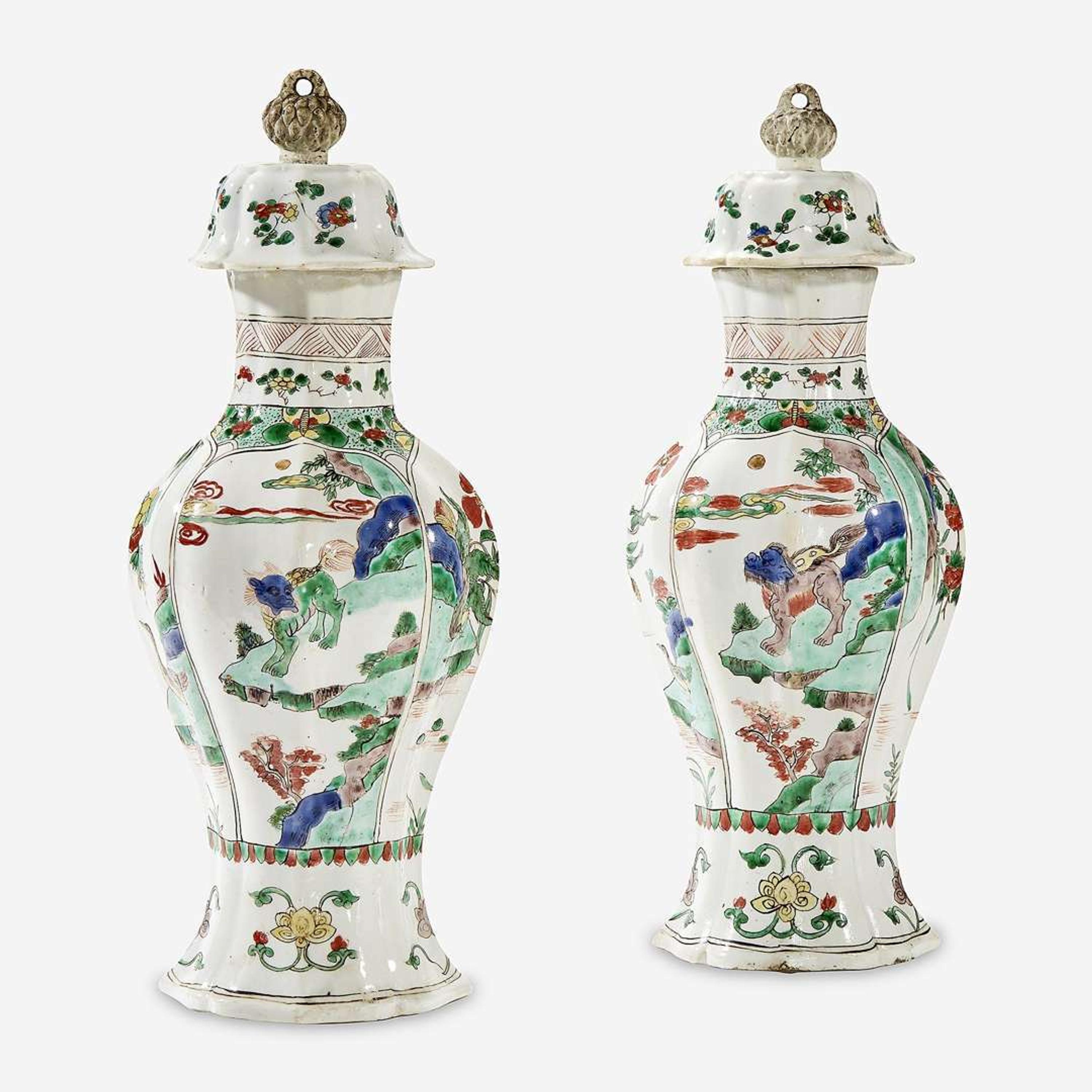 A Pair of Chinese Famille Verte-Decorated Porcelain Baluster Vases and Covers Kangxi period