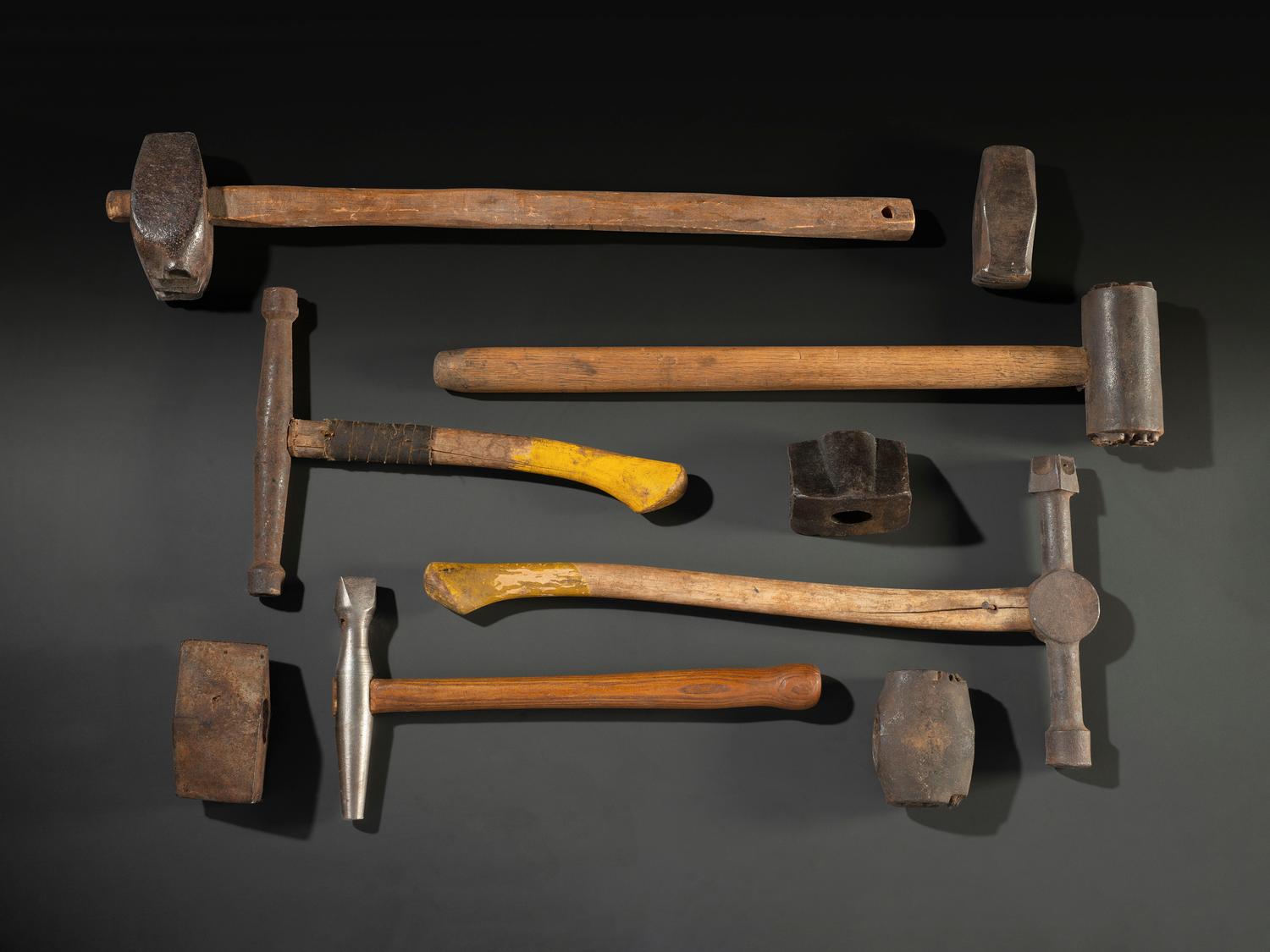 Nine Cast Iron Logging Stamps and Hammers