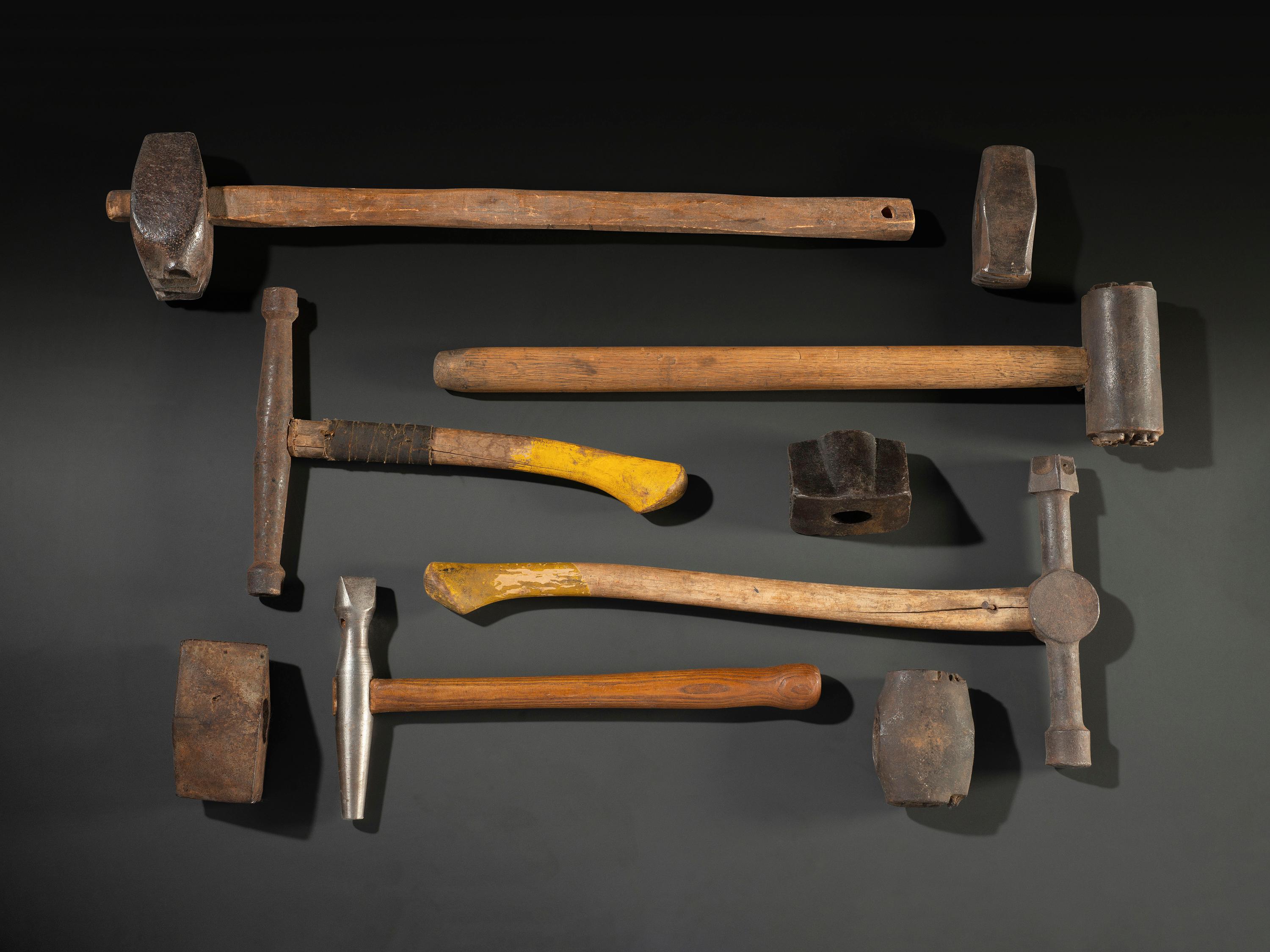 Nine Cast Iron Logging Stamps and Hammers