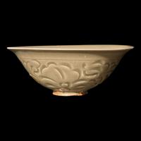 A Chinese Yaozhou Celadon 'Fish' Bowl, Northern Song Dynasty 北宋 耀州窯刻划花魚紋碗