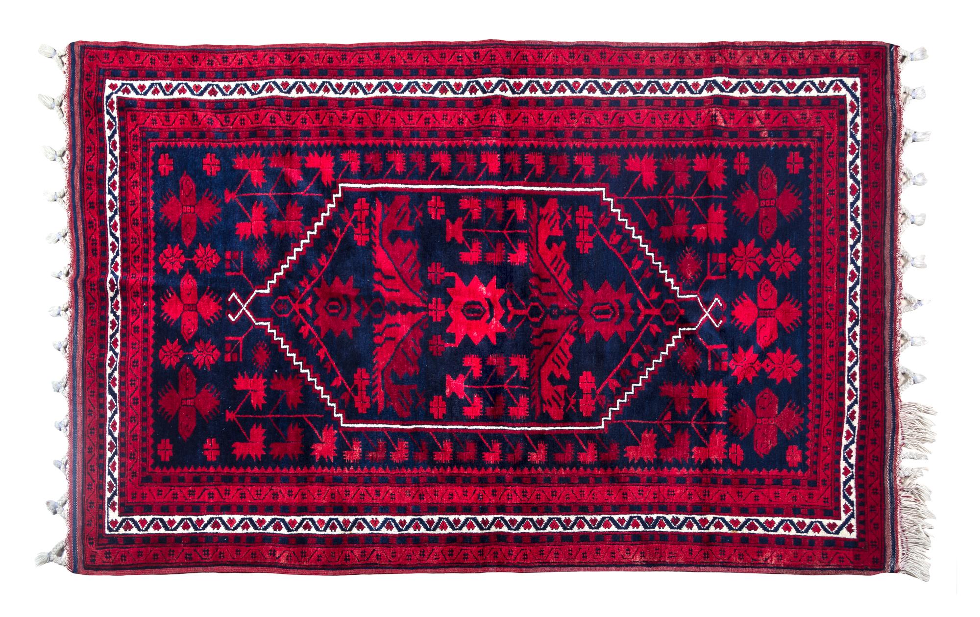 An Afghan Wool Rug 6 feet x 4 feet.