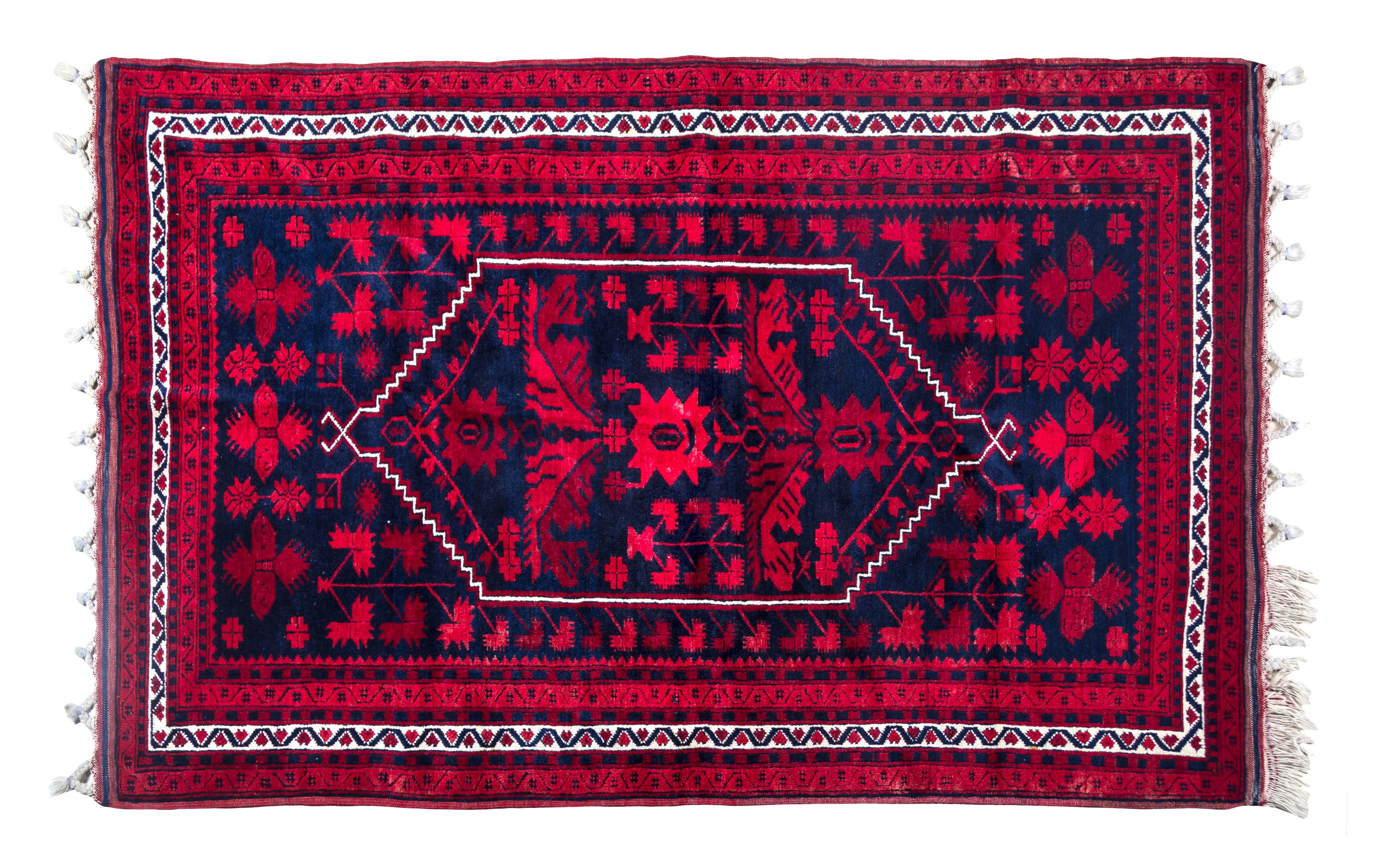 An Afghan Wool Rug 6 feet x 4 feet.
