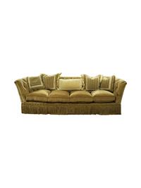 An Upholstered Sofa Height 34 x length 120 inches.
