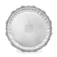A George III Silver Salver, John Watson, Sheffield, 1820, the undulating rim worked to show rocaille, volutes and floral decoration, ce