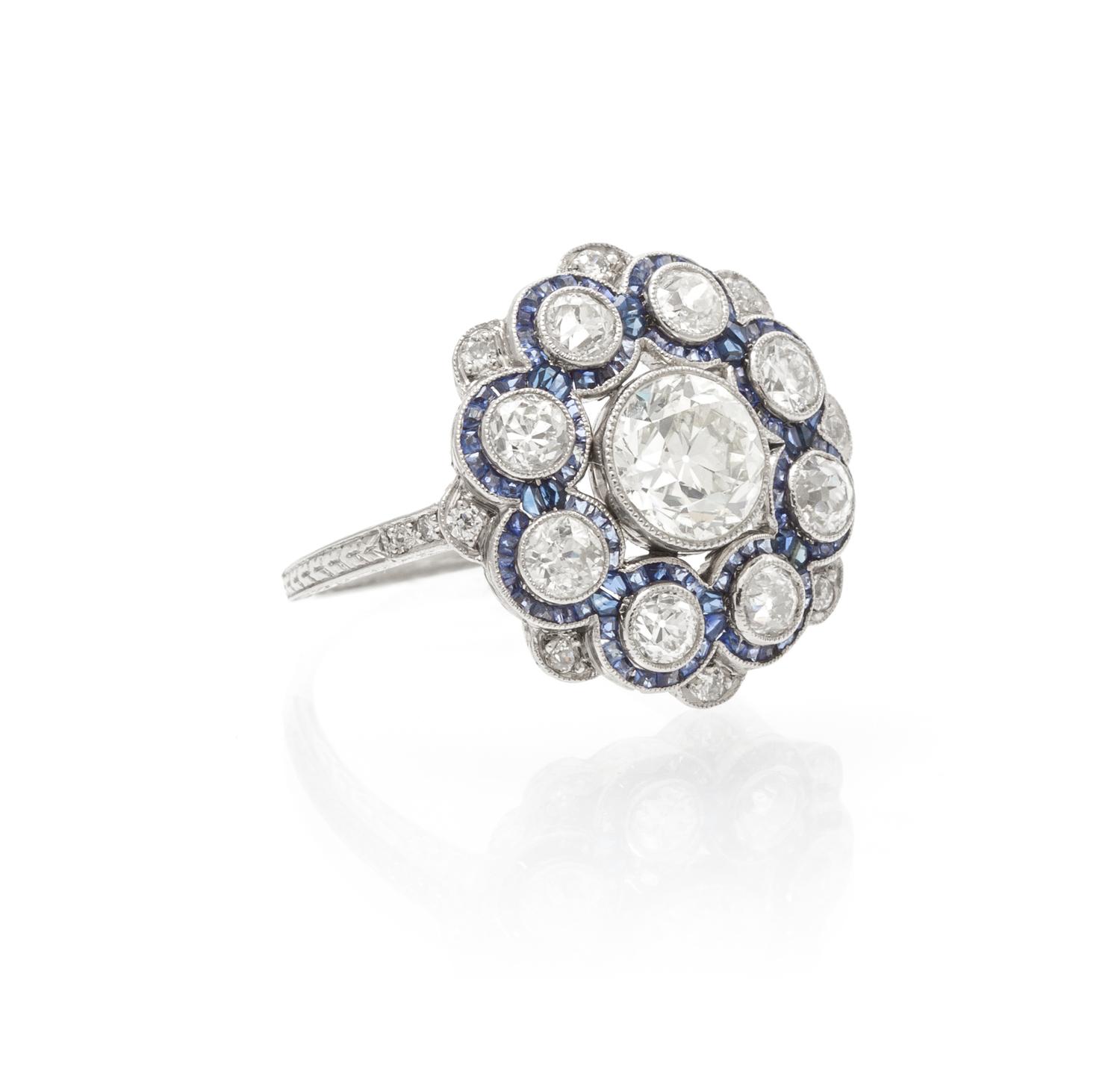 An Edwardian Platinum, Diamond and Sapphire Ring, 3.00 dwts.