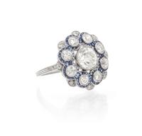 An Edwardian Platinum, Diamond and Sapphire Ring, 3.00 dwts.