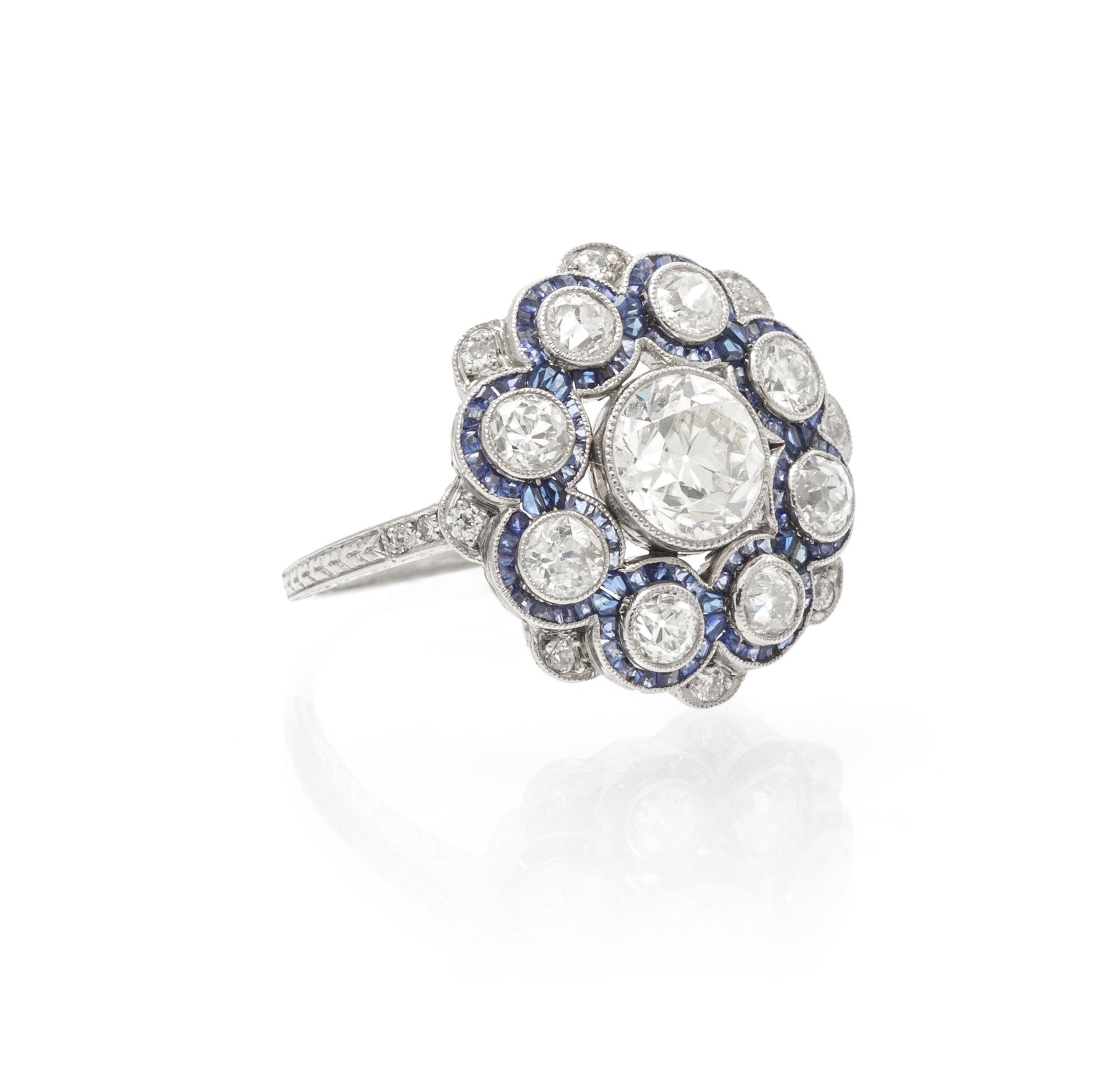 An Edwardian Platinum, Diamond and Sapphire Ring, 3.00 dwts.