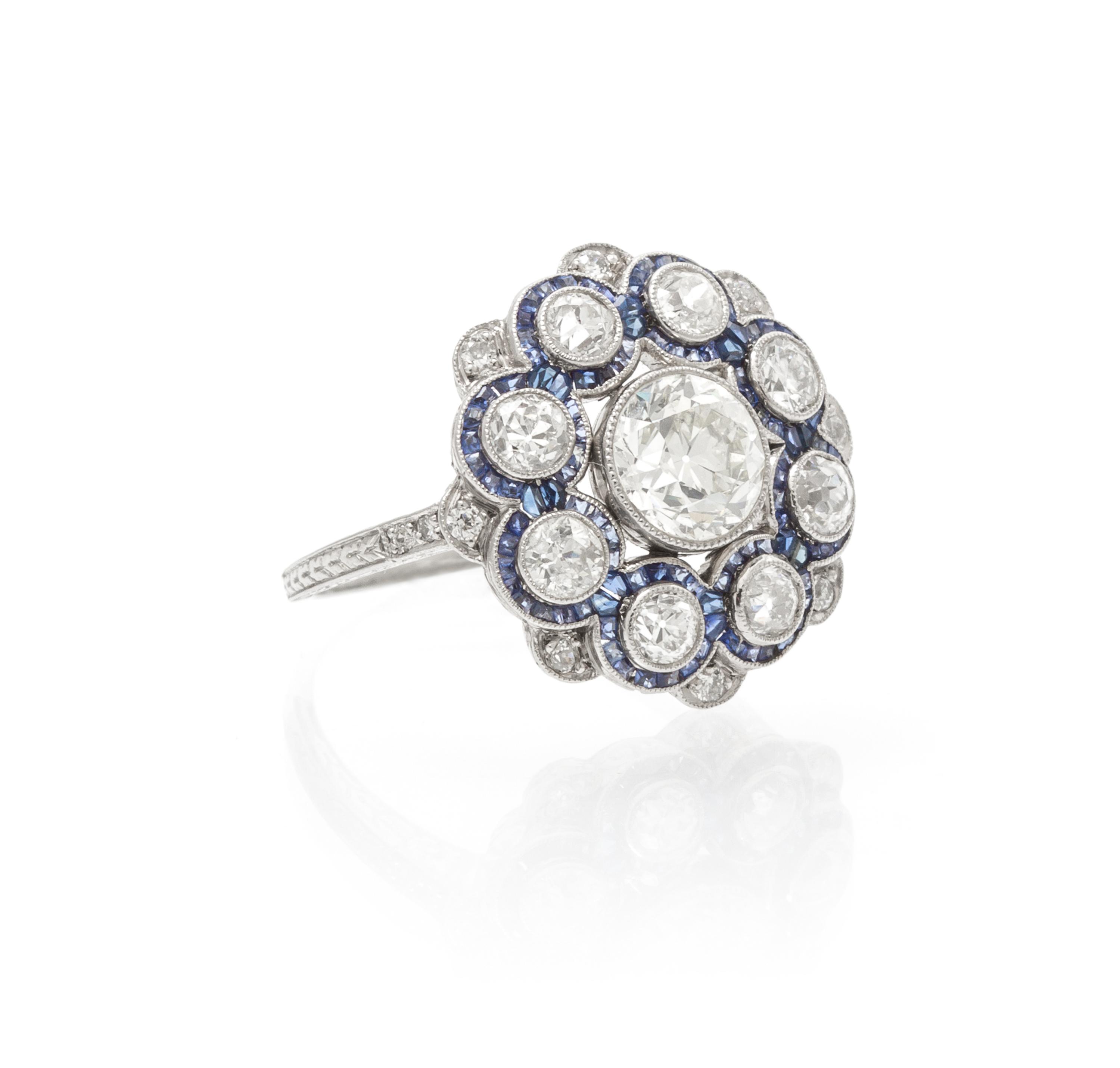 An Edwardian Platinum, Diamond and Sapphire Ring, 3.00 dwts.
