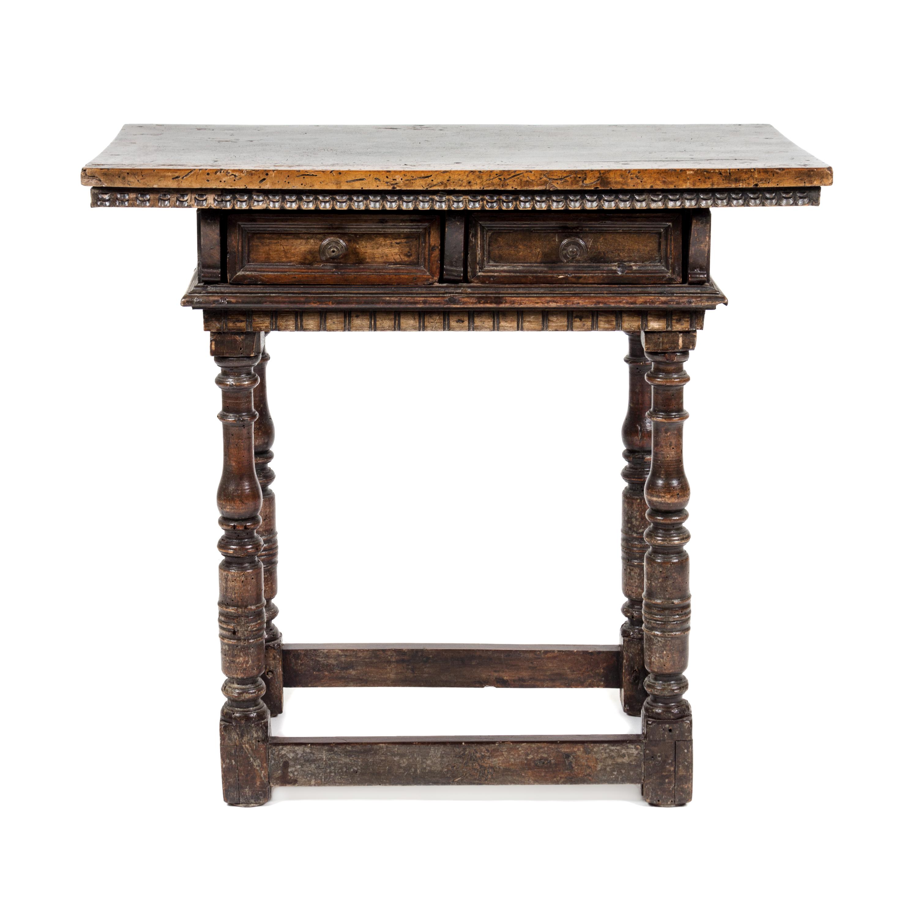 A Jacobean Style Walnut Side Table Height 30 1/2 x width 33 x depth 18 1/2 inches.