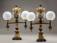 A Pair of Classical Gilt and Patinated Bronze Two-Light Argand Lamps with Shades