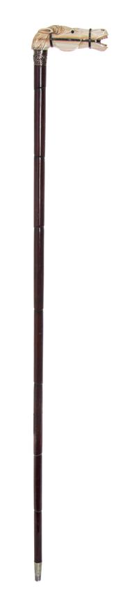 An American Ivory Handled Cane, Length of handle 4 1/4 x length overall 34 3/8 inches.