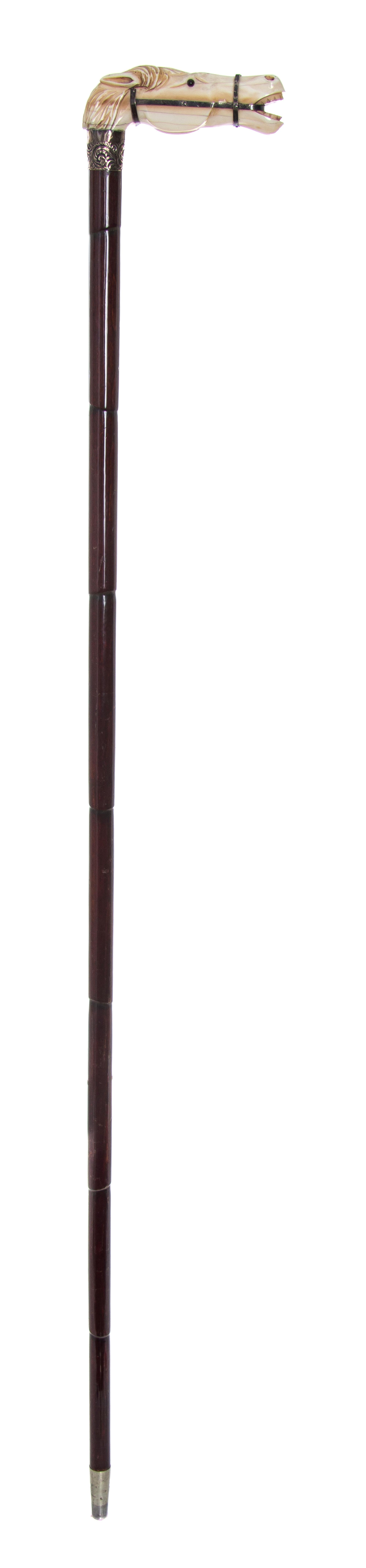 An American Ivory Handled Cane, Length of handle 4 1/4 x length overall 34 3/8 inches.