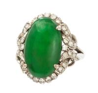 An 18 Karat White Gold, Jade and Diamond Ring, Circa 1950, 5.10 dwts.