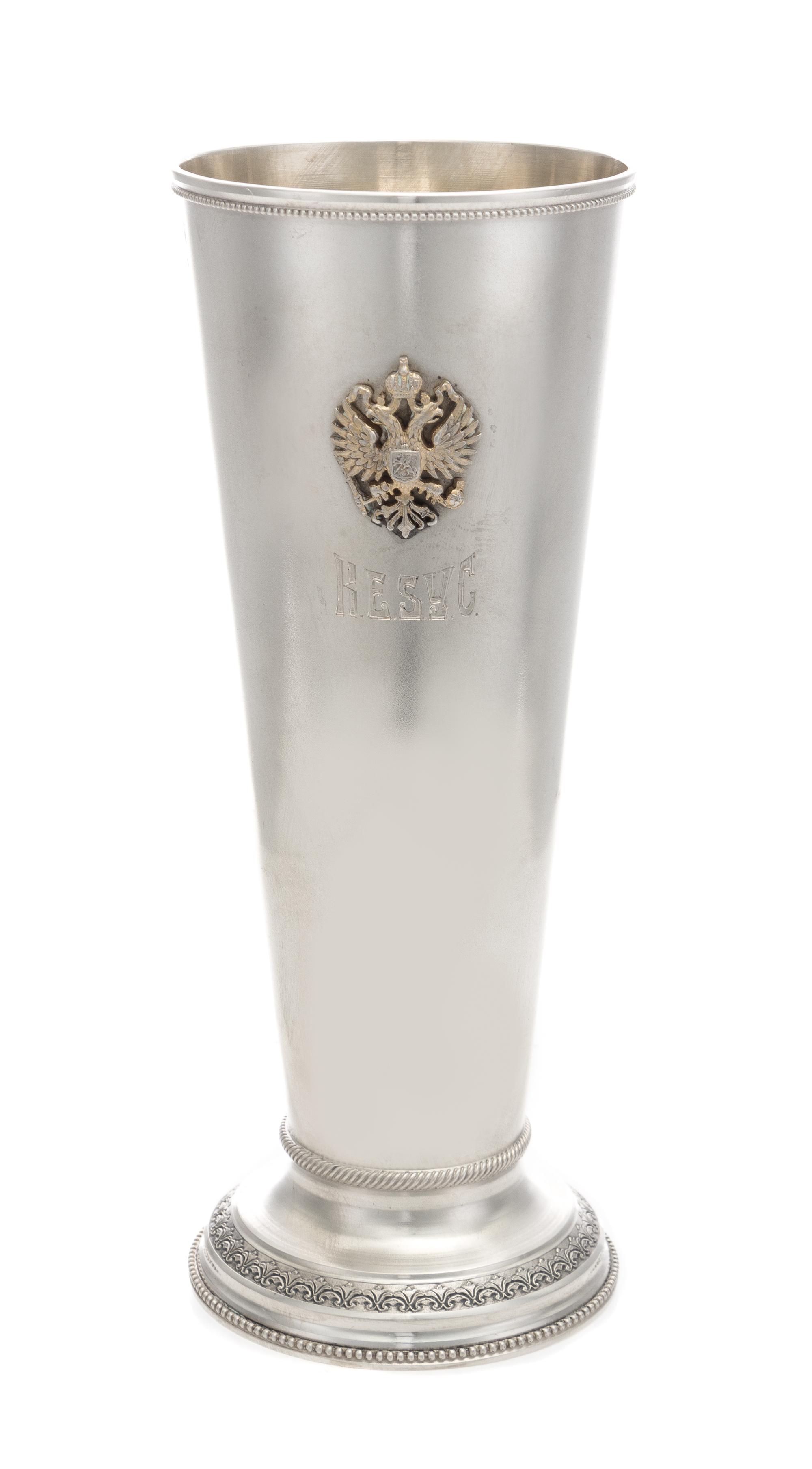 A Russian Silver Beaker, Maker's Mark Obscured, St. Petersburg, Late 19th/Early 20th Century, of tapering cylindrical form, the body wi
