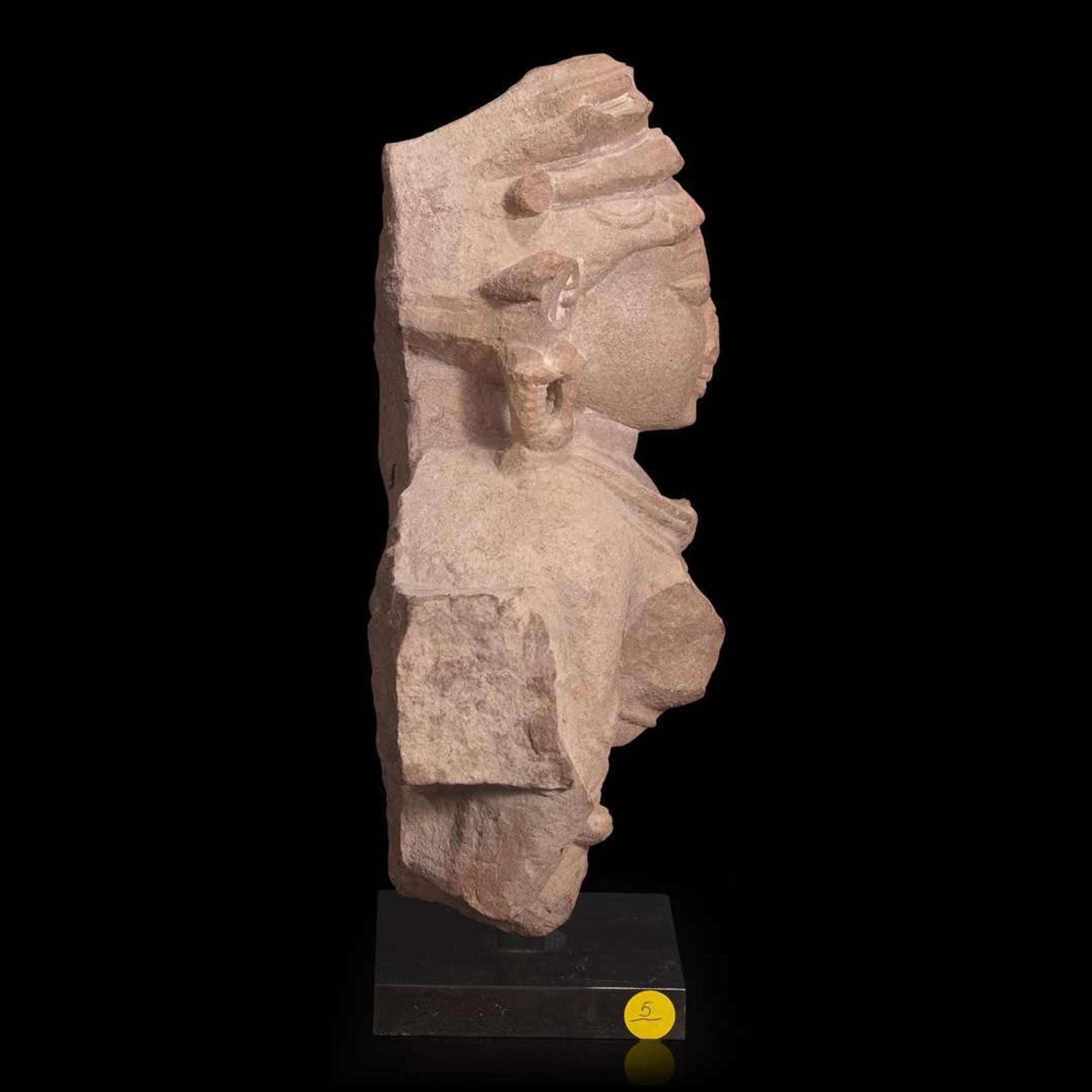 An Indian carved pinkish-buff sandstone bust of a female deity 砂岩雕女神像 Uttar Pradesh, 10th / 11th century ??? ??????