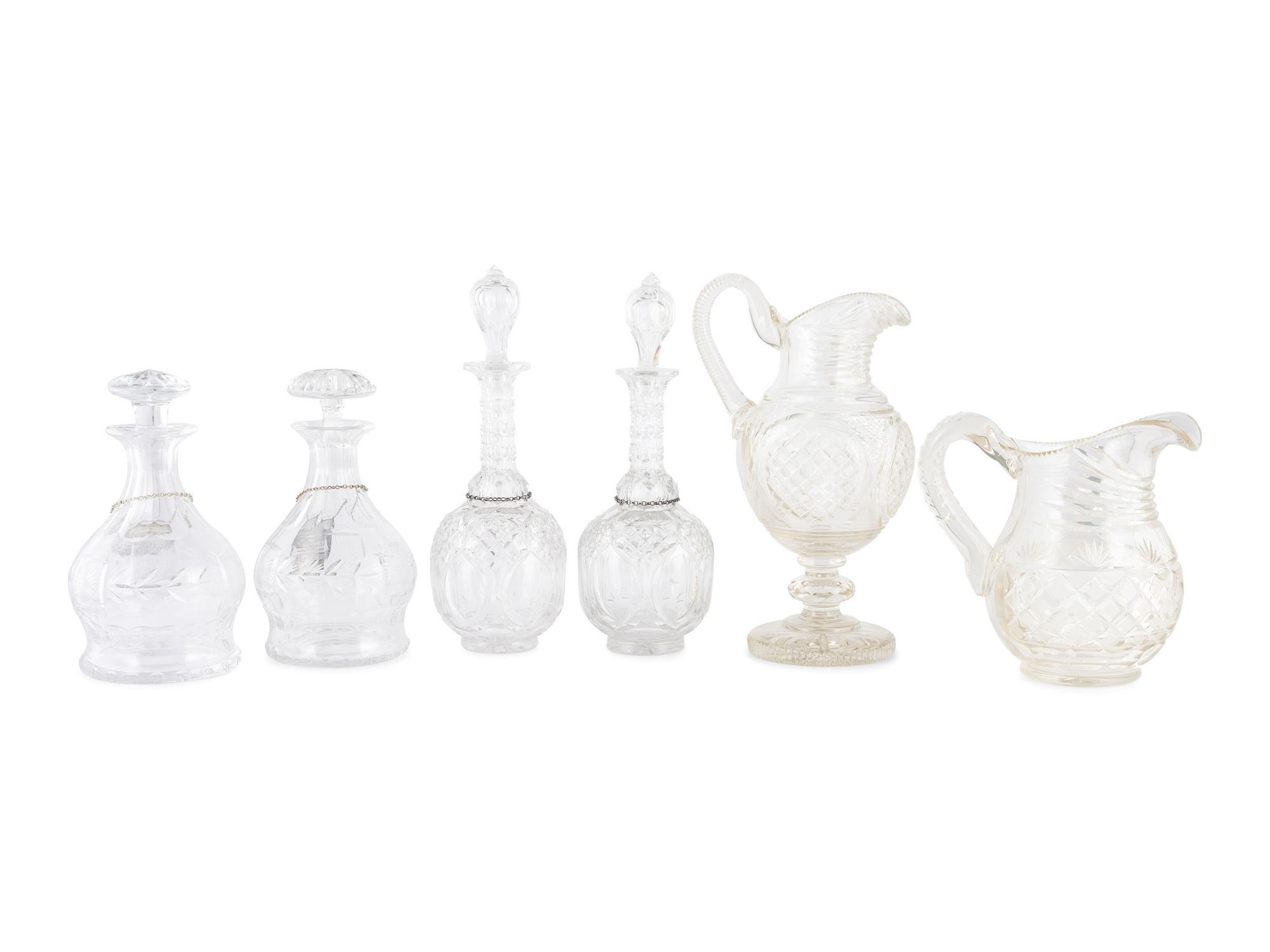 Four Cut Glass Decanters and Two Pitchers