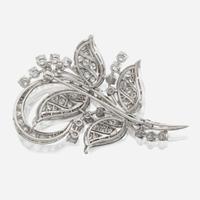 A diamond and platinum brooch