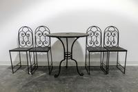 A Wrought Iron Café Set Height of table 29 3/4 inches. — 20TH CENTURY