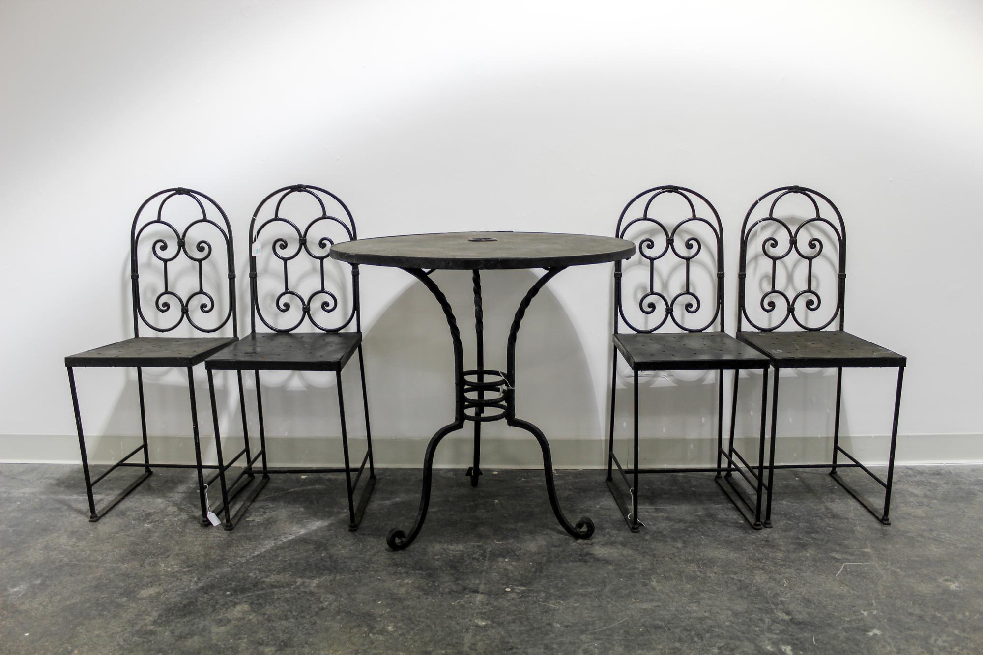 A Wrought Iron Café Set Height of table 29 3/4 inches. — 20TH CENTURY