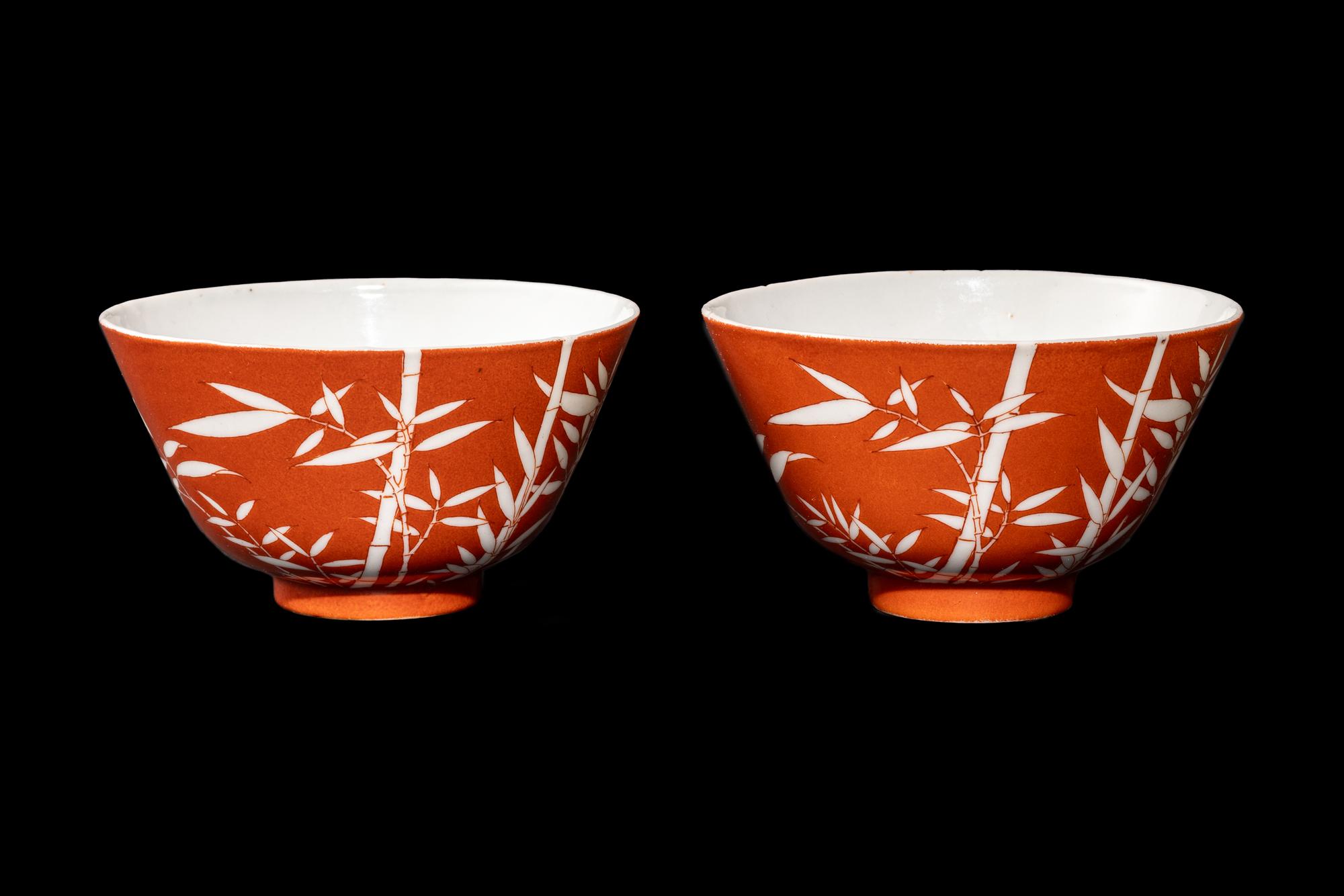 A Pair of Chinese Coral Red Ground Porcelain 'Bamboo' Tea Bowls