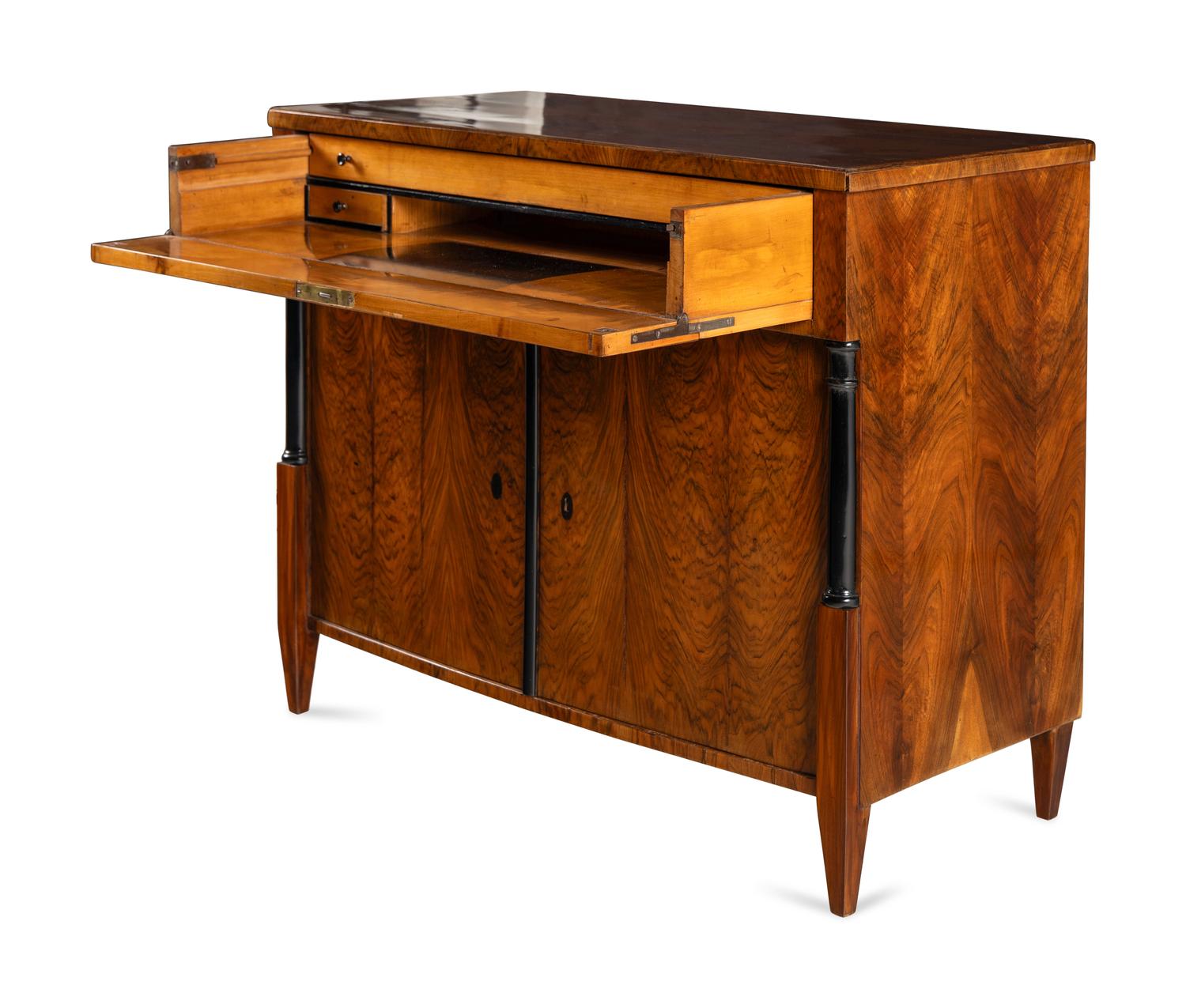 An Austrian Walnut and Part-Ebonized Bureau Commode