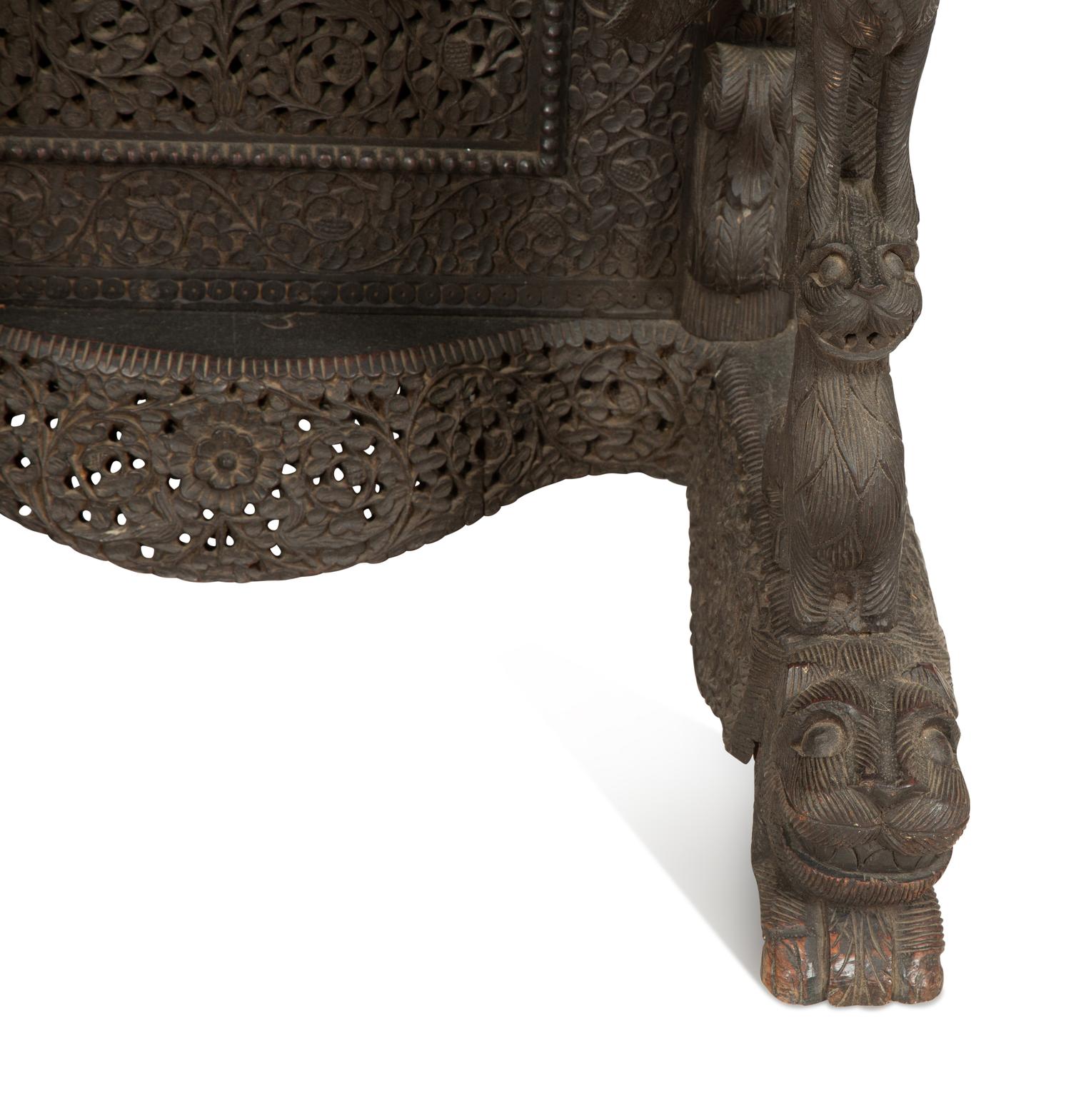 An Anglo-Burmese Carved Teak Davenport Desk