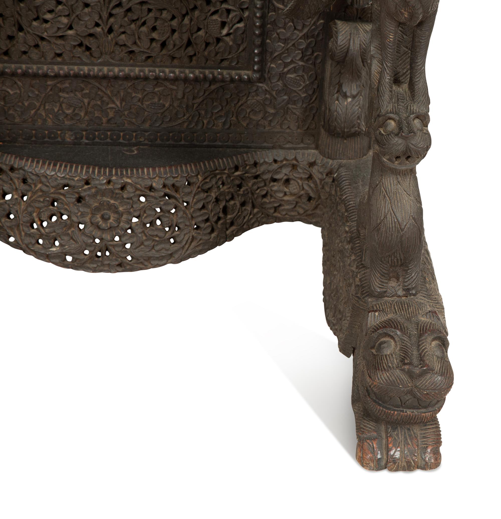 An Anglo-Burmese Carved Teak Davenport Desk