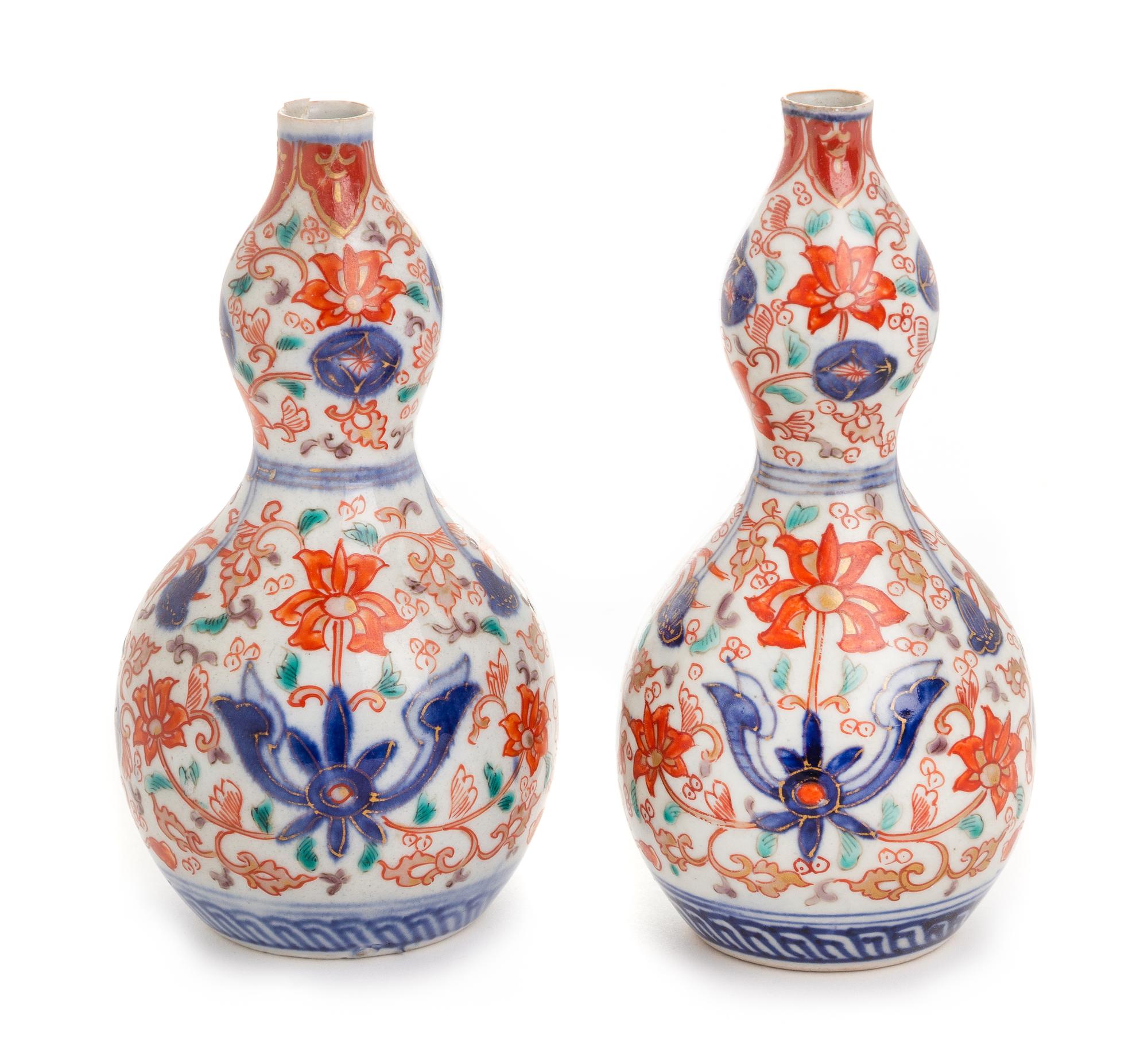 A Pair of Japanese Imari Porcelain Sake Bottles Height of each 6 inches. — MID-19TH CENTURY