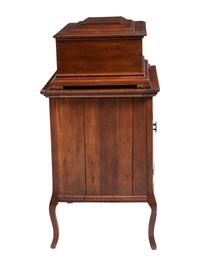 A Mira Mahogany-Cased Disc Music Box and Cabinet