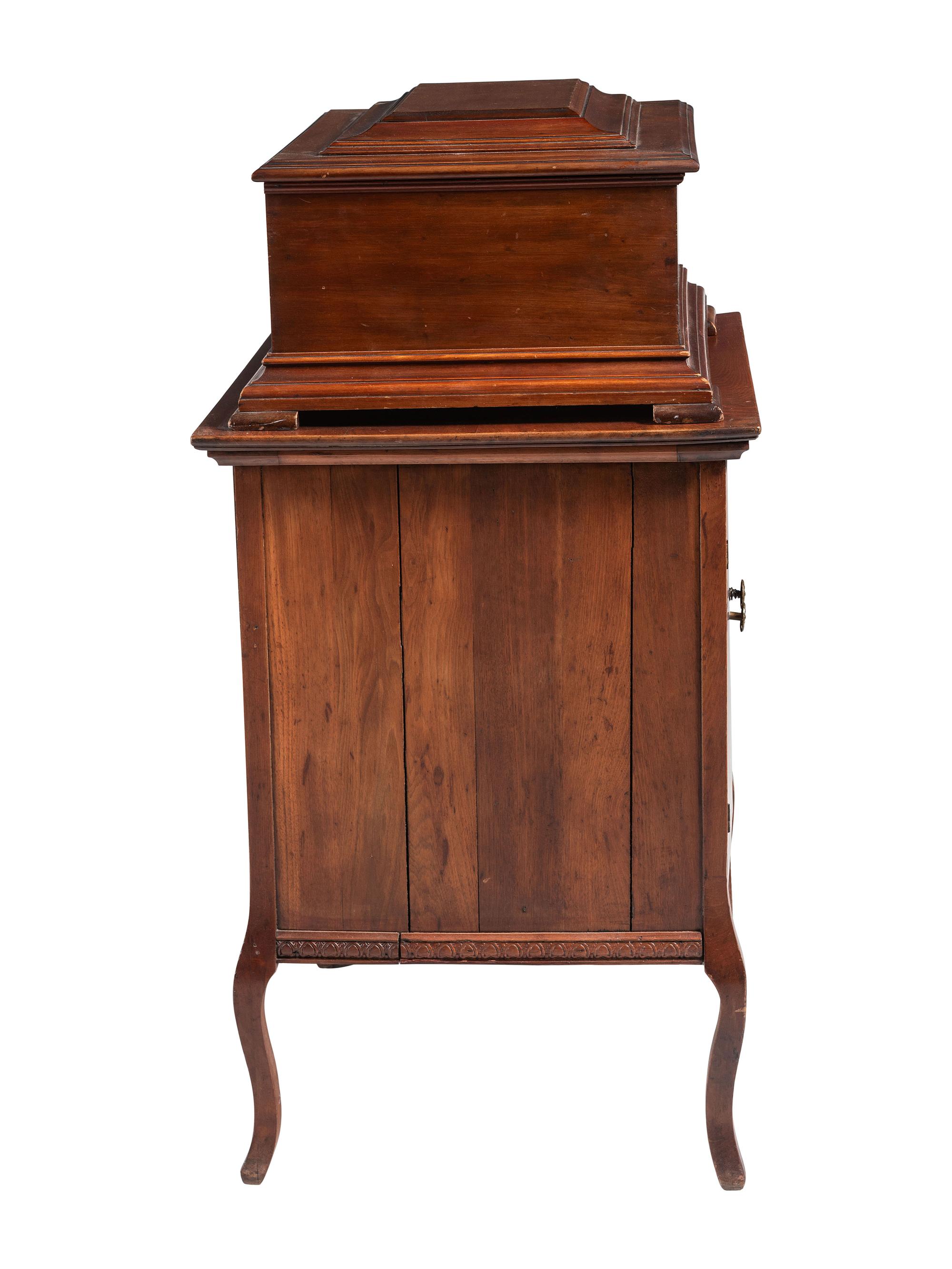 A Mira Mahogany-Cased Disc Music Box and Cabinet