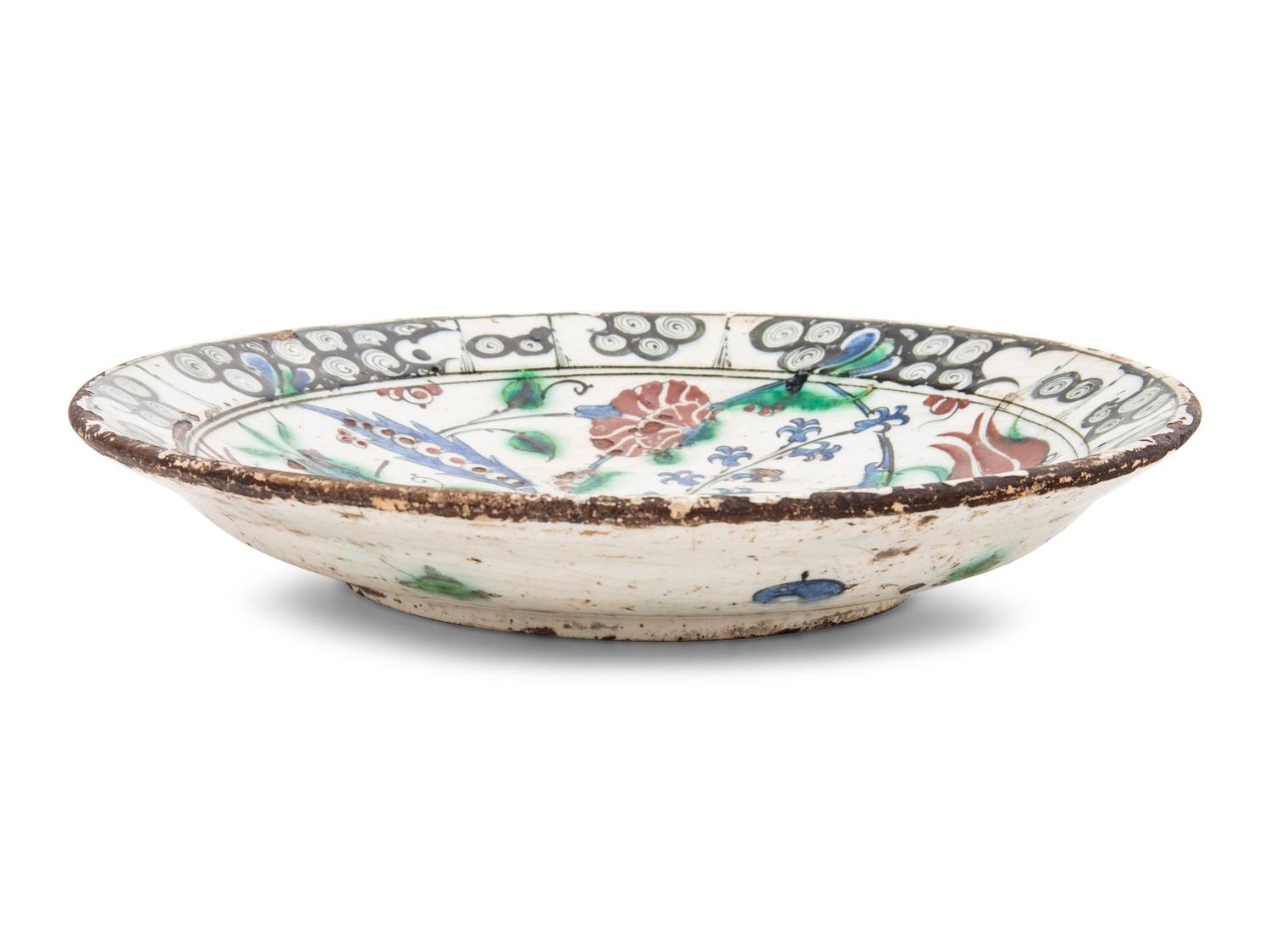 An Iznik Pottery Charger