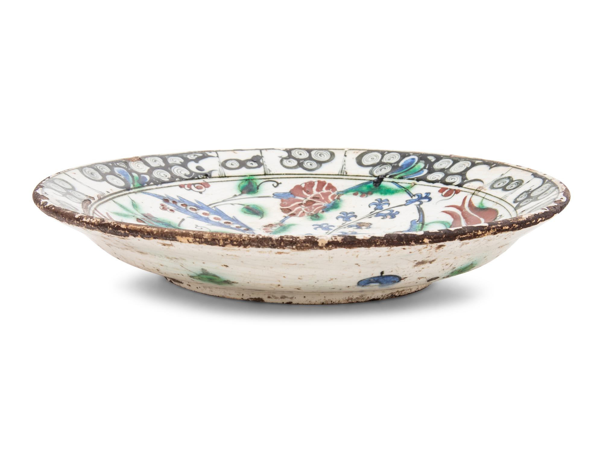 An Iznik Pottery Charger